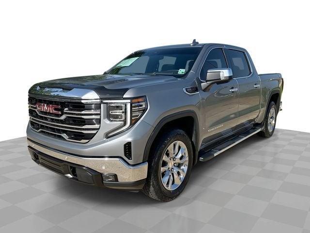 2023 GMC Sierra 1500 SLT in Sterling Metallic — front three-quarter view